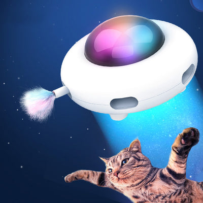 White UFO electric cat toy with a colorful glowing dome and a pastel feather attachment. - Image 10