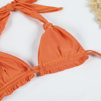 Orange pure color bikini with knotted halter top and banded thong bottoms, displayed flat on a white background. - Image 21