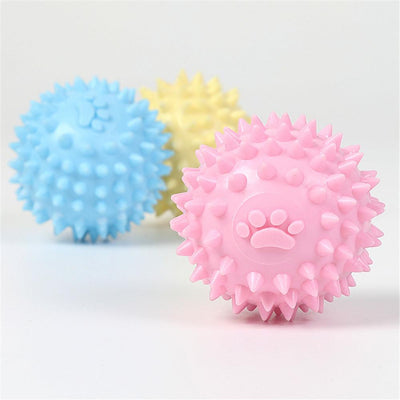 Yellow spiky pet toy ball with a paw print design, made from TPR for interactive play and molars. - Image 3
