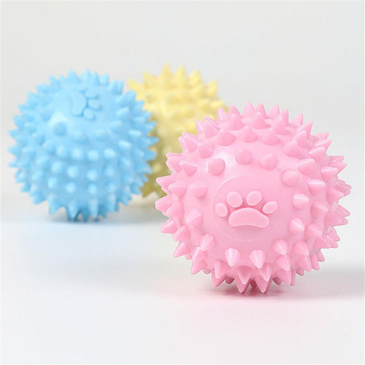 Yellow spiky pet toy ball with a paw print design, made from TPR for interactive play and molars. - Image 3