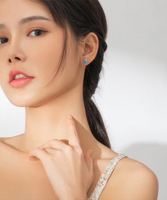 Aretes de Pulpo Plateados - Diseño Adorable para Mujer