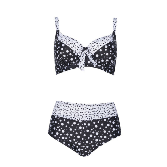 Retro black and white polka dot bikini with a tie-front top and high-waisted bottom.
