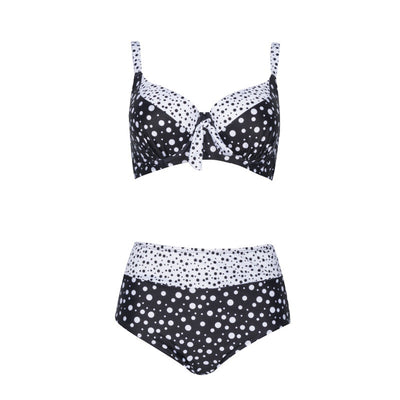 Retro black and white polka dot bikini with a tie-front top and high-waisted bottom.