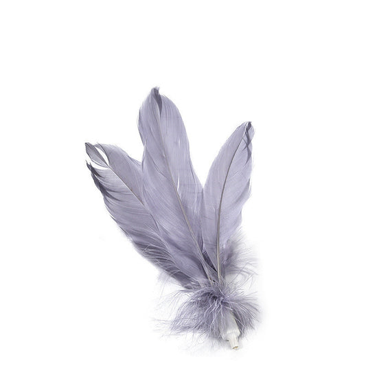 White pet tumbler cat toy with grey feathers on top and fish patterns on the spherical base. - Image 2