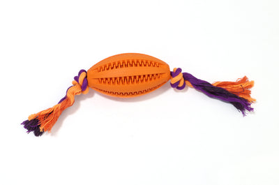 Green rubber pet molar toy with a football shape and textured surface, featuring red and green braided rope knots. - Image 21