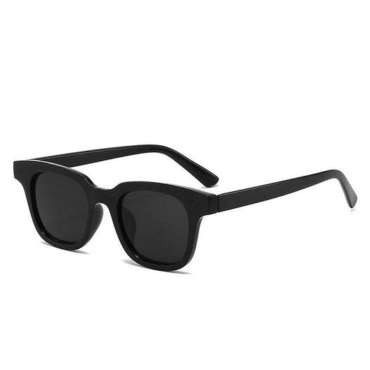 Black frame square sunglasses with light blue lenses, angled on a white background. - Image 6