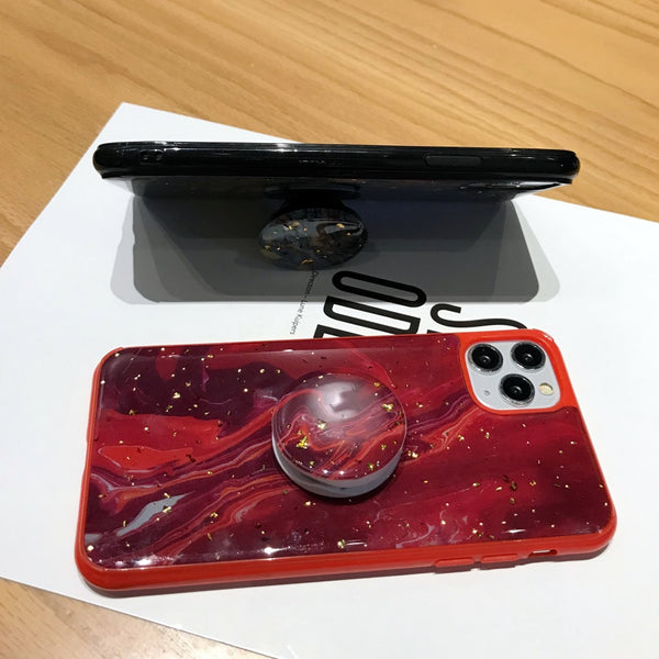 Funda para móvil con diseño mármol y soporte integrado