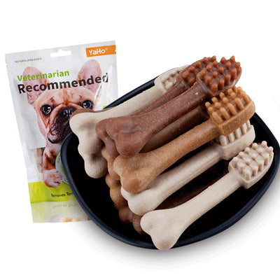 YaHo bone-shaped dog snacks in various brown and tan shades, some with dental nubs, in a black bowl. - Image 3
