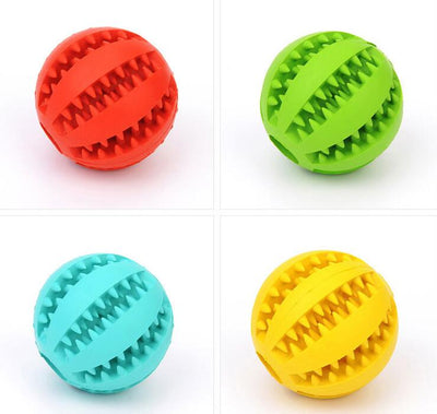 Bright green rubber pet toy ball with textured spikes and ridges for dental cleaning and food dispensing. - Image 3