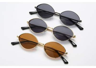 Oval women's sunglasses with dark gray lenses and a gunmetal metal frame, featuring textured temples. - Image 25