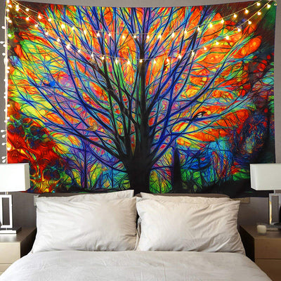 Colorful tree forest tapestry with vibrant abstract art and string lights, hung above a bed with blue bedding. - Image 5