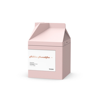 Pink milk carton shaped humidifier with a white label, featuring "Milkbox Humidifier" text and a bcase logo. - Image 9