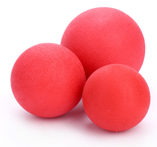 Three red rubber pet balls of varying sizes, attached to a red and white braided rope, for chewing and play. - Image 3