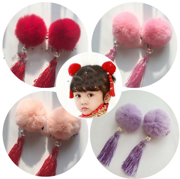 Pasador infantil con borla y pompón decorativo