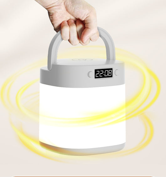 White rechargeable LED table lamp with a digital clock display and a light gray carrying handle. - Image 7