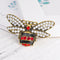 Color butterfly brooch Dorado