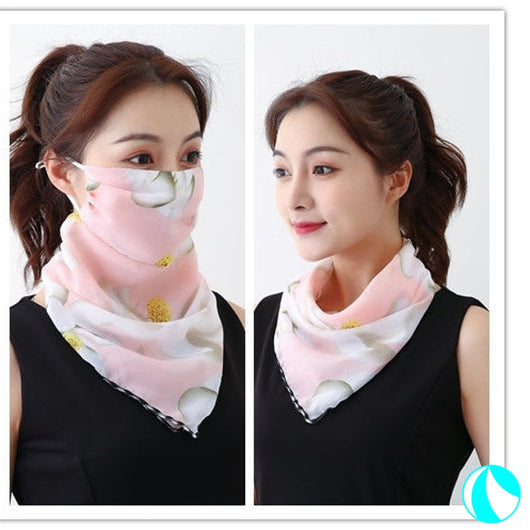 White women's UV protection scarf with black speckle pattern, worn as a face mask and neck scarf. - Image 18