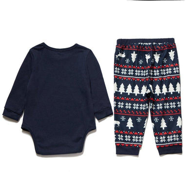 Matching navy blue family Christmas pajamas with white Christmas tree and "Merry Christmas" text, paired with patterned bottoms. - Image 5