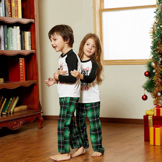 Family of four in matching Christmas pajamas with 'Dear Santa THEY'RE the NAUGHTY ones' graphic and green plaid pants. - Image 5