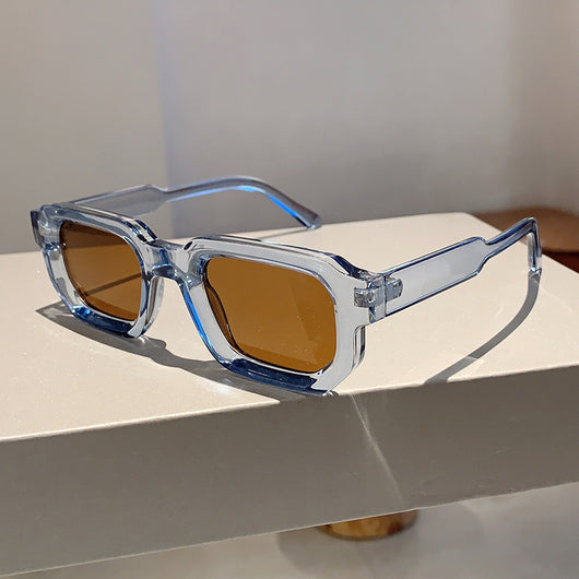 Black square-frame sunglasses with thick, angular frames and dark blue lenses, shown on a white background. - Image 2
