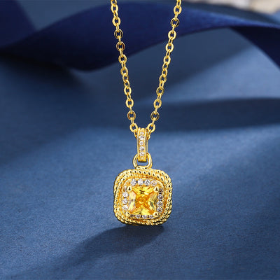 Women's gold-toned jewelry set with a ring, necklace, and stud earrings, each featuring a square yellow gemstone surrounded by small clear stones. - Image 8