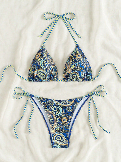 Female creative minimally printed split bikini set with a vibrant bohemian pattern and tie-side bottoms. - Image 11