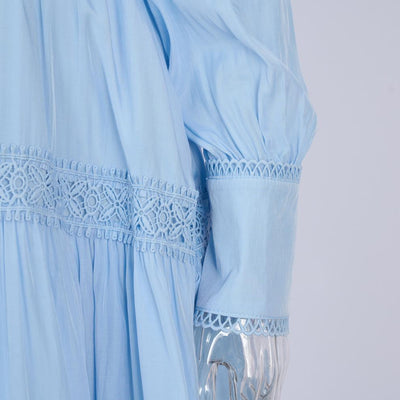 Falda Larga Elegante con Blusa Bordada y Mangas Linterna Ajustadas - Image 10