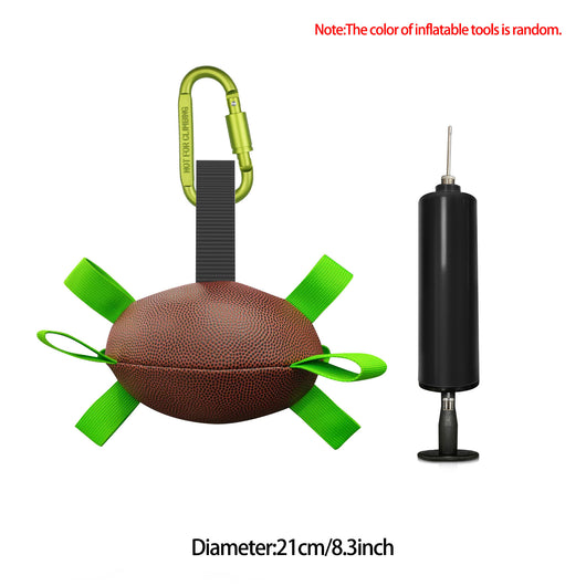 Interactive dog football toy with black and white panels, paw prints, green nylon tabs, and a green carabiner clip. Includes a black inflation pump. - Image 79
