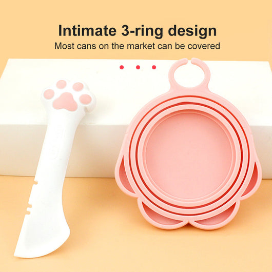 Gray pet food spoon with a paw print handle and a matching paw-shaped can opener lid. - Image 5
