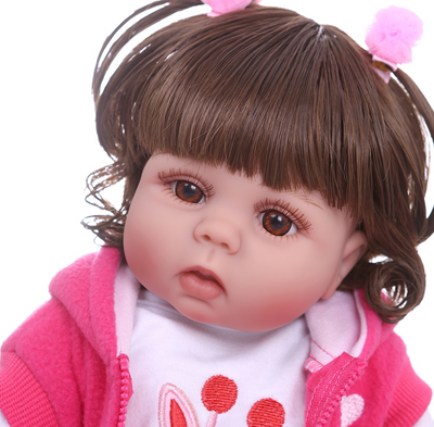 Muñeca Reborn Bebé de 49cm con Cabello Rizado y Cuerpo de Silicona Completa - Image 3