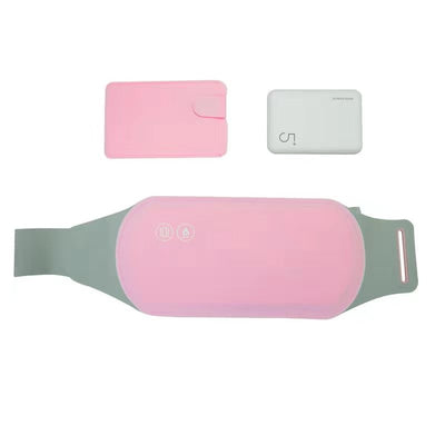 Woman relaxing on a couch, wearing a pink warm palace belt around her lower abdomen for comfort and pain relief. - Image 4