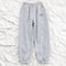 Pantalones Cintura Alta con Bordado Smiley Deportivo