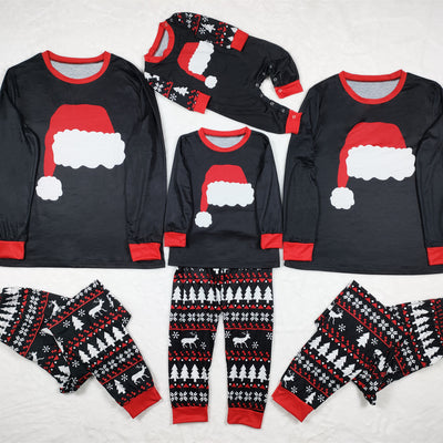 Black long-sleeve Christmas pajama top with a red Santa hat graphic and matching pants with a reindeer and tree pattern. - Image 2