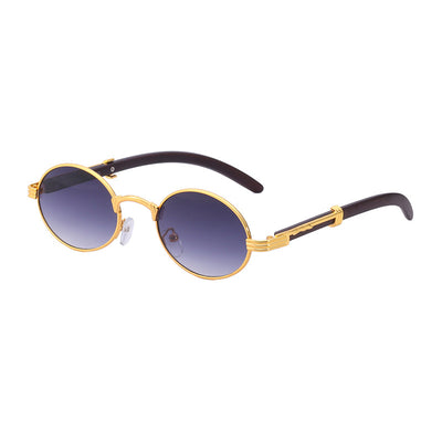 Retro oval sunglasses with gold metal frames and dark wood-like temples, featuring gradient black lenses. - Image 3