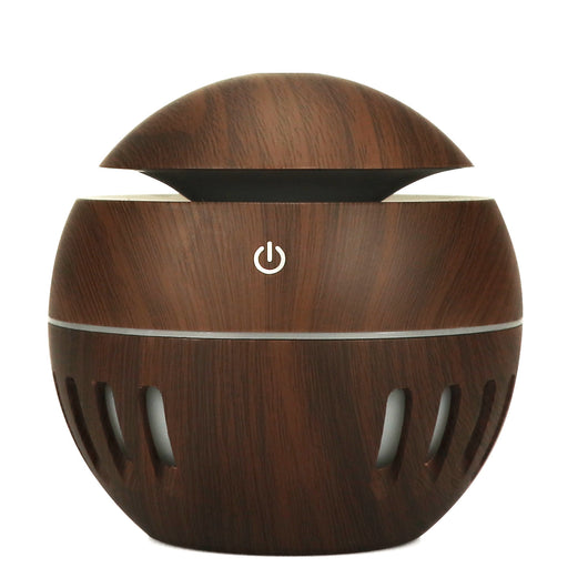White portable home office humidifier with a spherical base, dome top, and glowing blue LED light accents. - Image 13