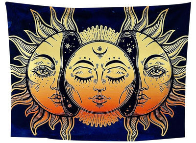 Printed sun and moon tapestry with three celestial faces in gold and orange against a dark blue background.