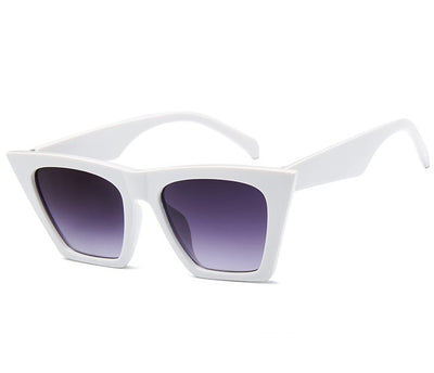 Transparent nude cat-eye sunglasses with brown gradient lenses, featuring a vintage 90s fashion style for women. - Image 7