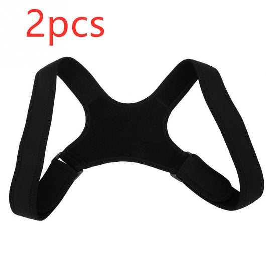 Black back shoulder spine posture corrector worn over a white long-sleeved shirt, showing adjustable straps. (2 pcs) - Image 13