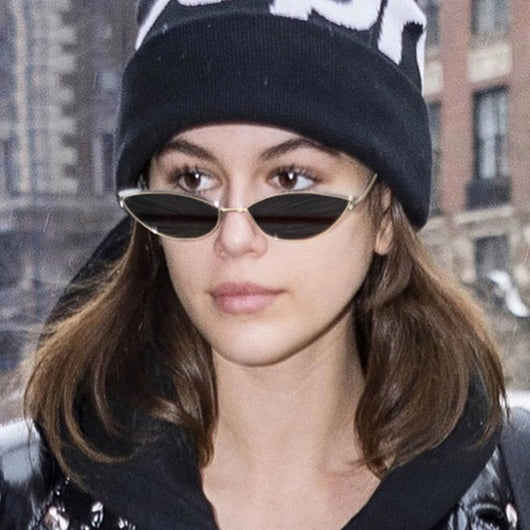 Retro cat eye sunglasses for women with bright yellow lenses and a sleek silver-tone metal frame. - Image 4