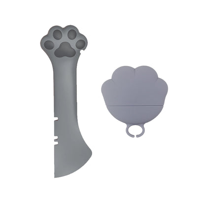 Gray pet food spoon with a paw print handle and a matching paw-shaped can opener lid. - Image 15