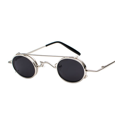 Retro round sunglasses with vibrant red lenses and a black metal frame, featuring a unique flip-up design. - Image 19