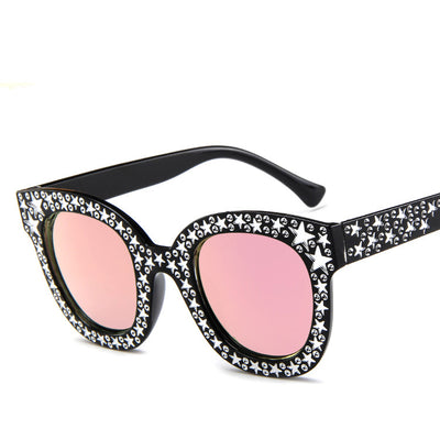 Black cat-eye sunglasses for ladies, featuring silver star embellishments on the frames and temples. - Image 11