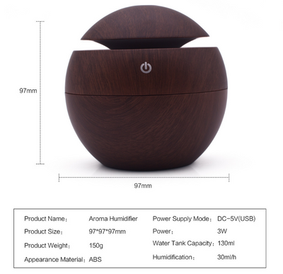 Black spherical ultrasonic atomizer with a power button icon, designed for aromatherapy and humidification. - Image 4