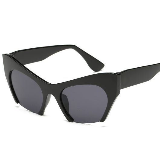 Red cat-eye sunglasses with silver mirrored lenses, featuring a bold retro frame design. - Image 14