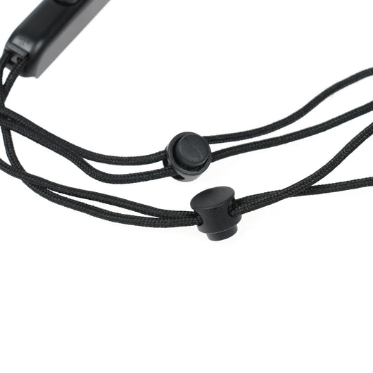 Two black Nintendo Switch Joy-Con wrist straps, one showing internal metal rail, the other with buttons and lanyard. - Image 6