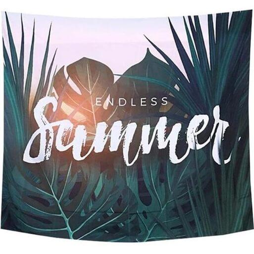 Endless Summer tapestry with white script over a tropical leaf print and a pink and orange sunset background.