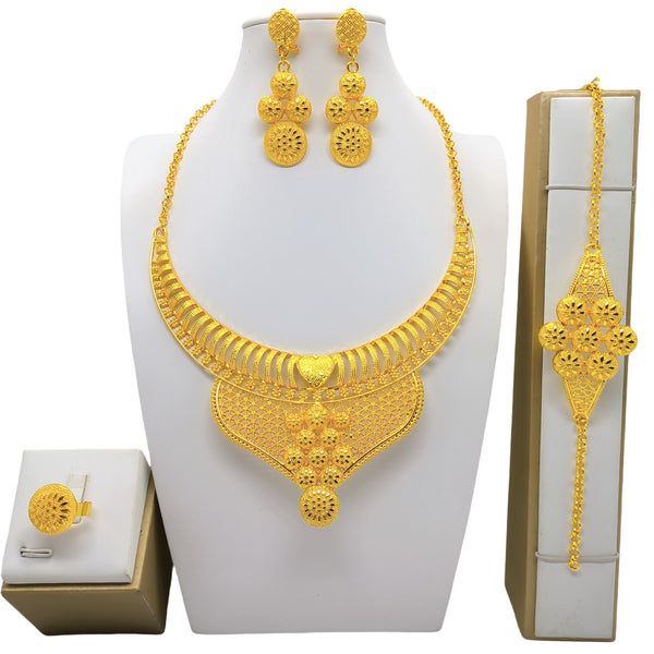 24K gold-colored four-piece jewelry set with peacock necklace, matching bracelet, earrings, and ring.