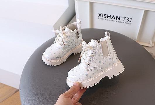 White toddler girls' boots with a holographic star pattern, lace-up front, and side zipper closure. - Image 32