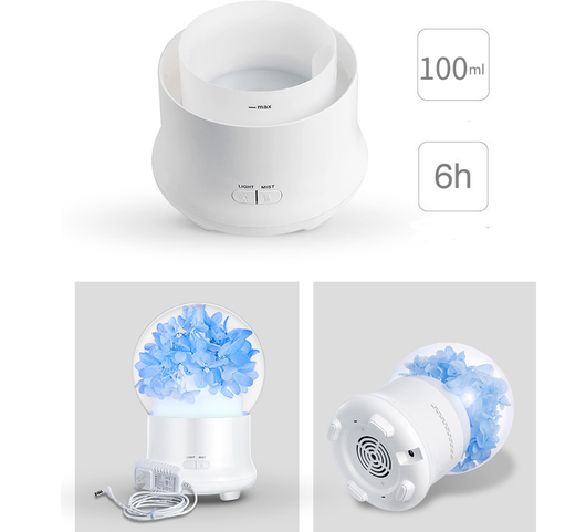 White aromatherapy machine with a clear dome top, featuring blue preserved flowers and an aqua glow. Includes 'LIGHT' and 'MIST' controls. - Image 6