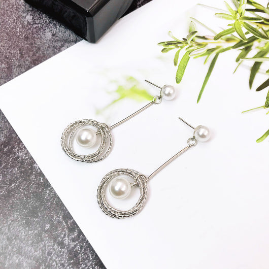 Aretes Coreanos Asimétricos con Flor de Perla y Moño - Image 8